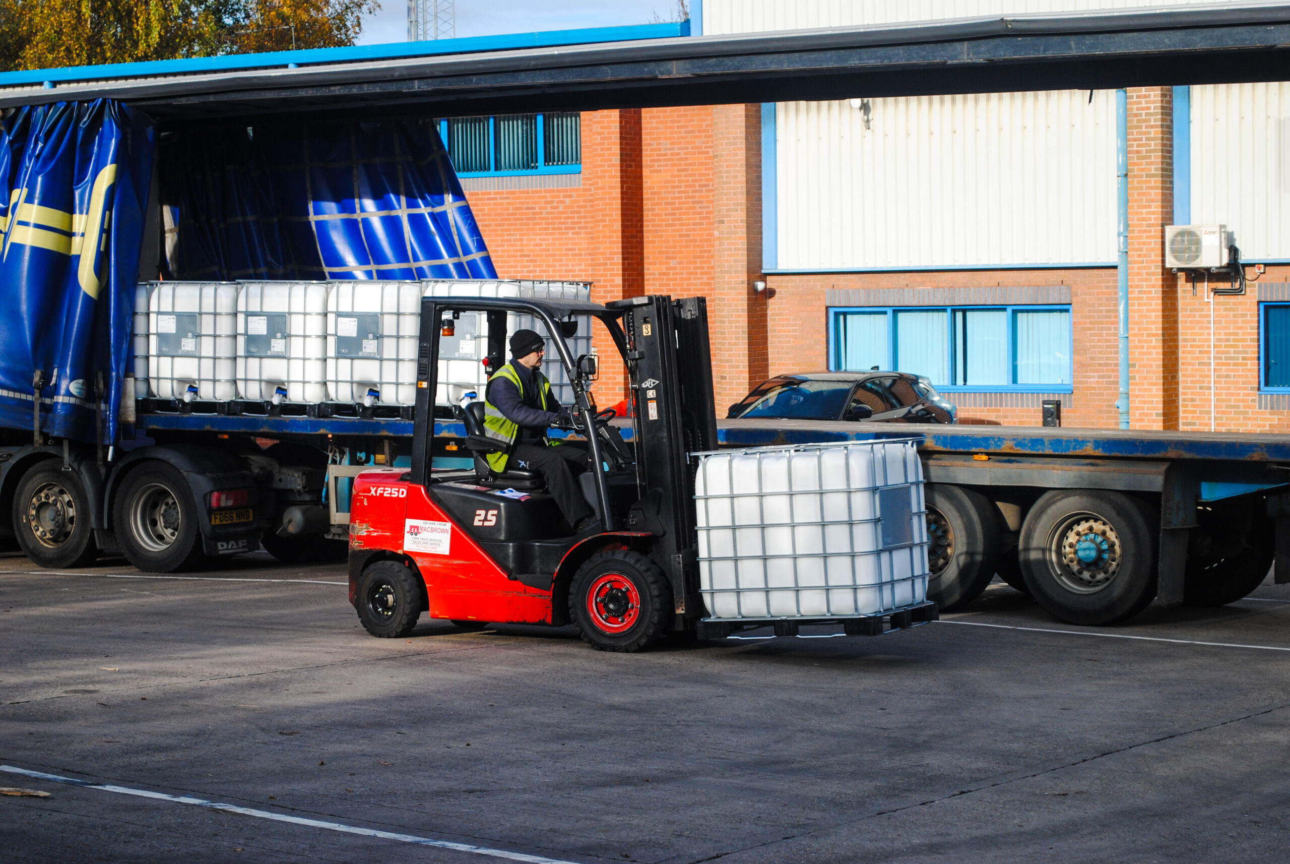 Jenkar warehouse worker moving cargo into the warehouse